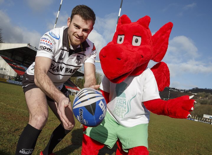 Pontypridd RFC's Geraint Walsh with Patch the Dragon from Fresh Start Wales at Sardis Road 2