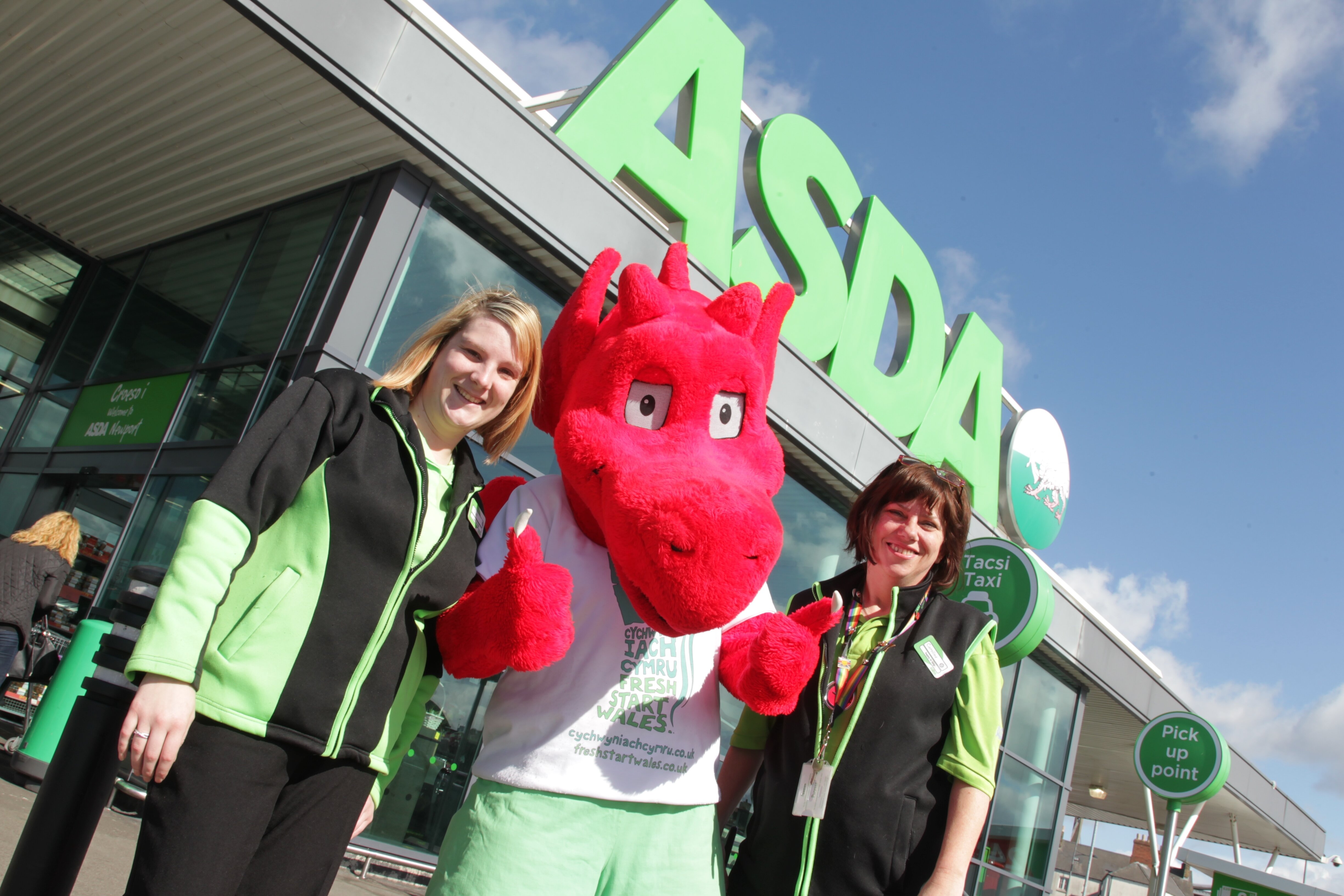 Sian Evans and Caroline Jones supporting the smoke-free cars campaign with Patch the Dragon